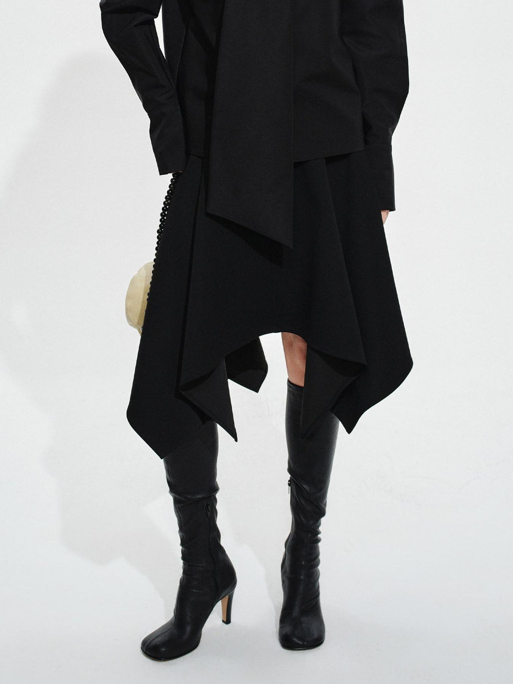 audreyyang Elegant Asymmetric Irregular Hem Mid Waist Front Zipper Black Midi Skirts