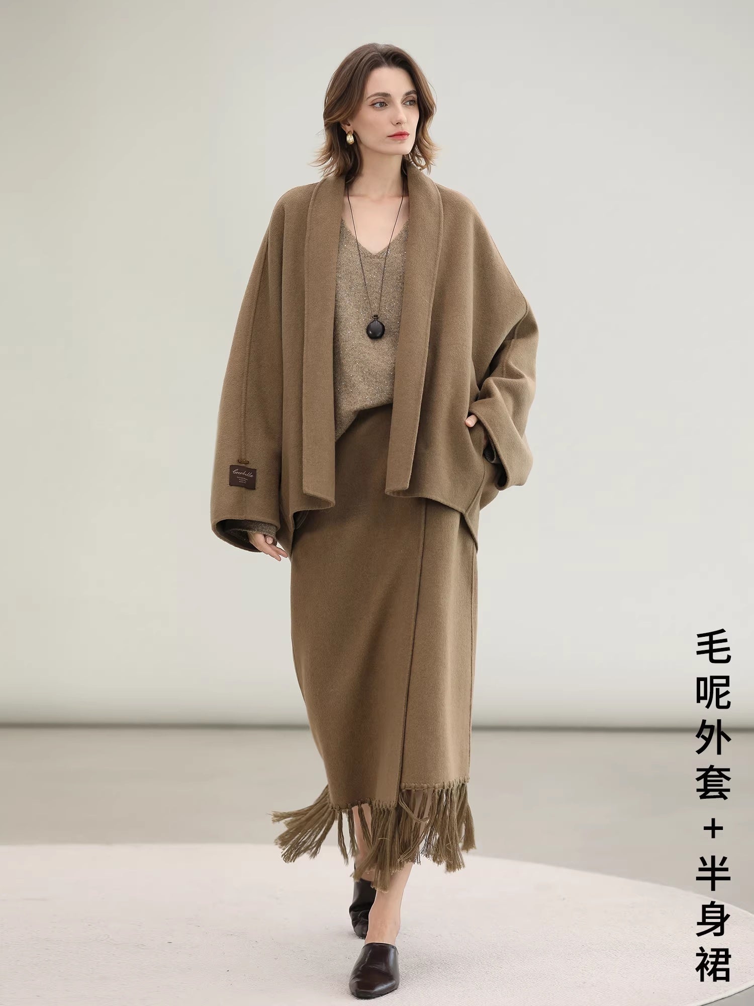 COCOBELLA_Wool_Blend_Shell_Embroidery_Tassel_Mid_Rise_Front_Slit_H_Silhouette_Office_Skirts_MISSTT