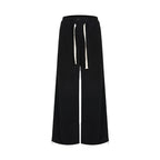 unspoken_High_Waist_Drawstring_Pockets_Minimalist_Workwear_For_Women_Black_Wide_Leg_Pants_MISSTT